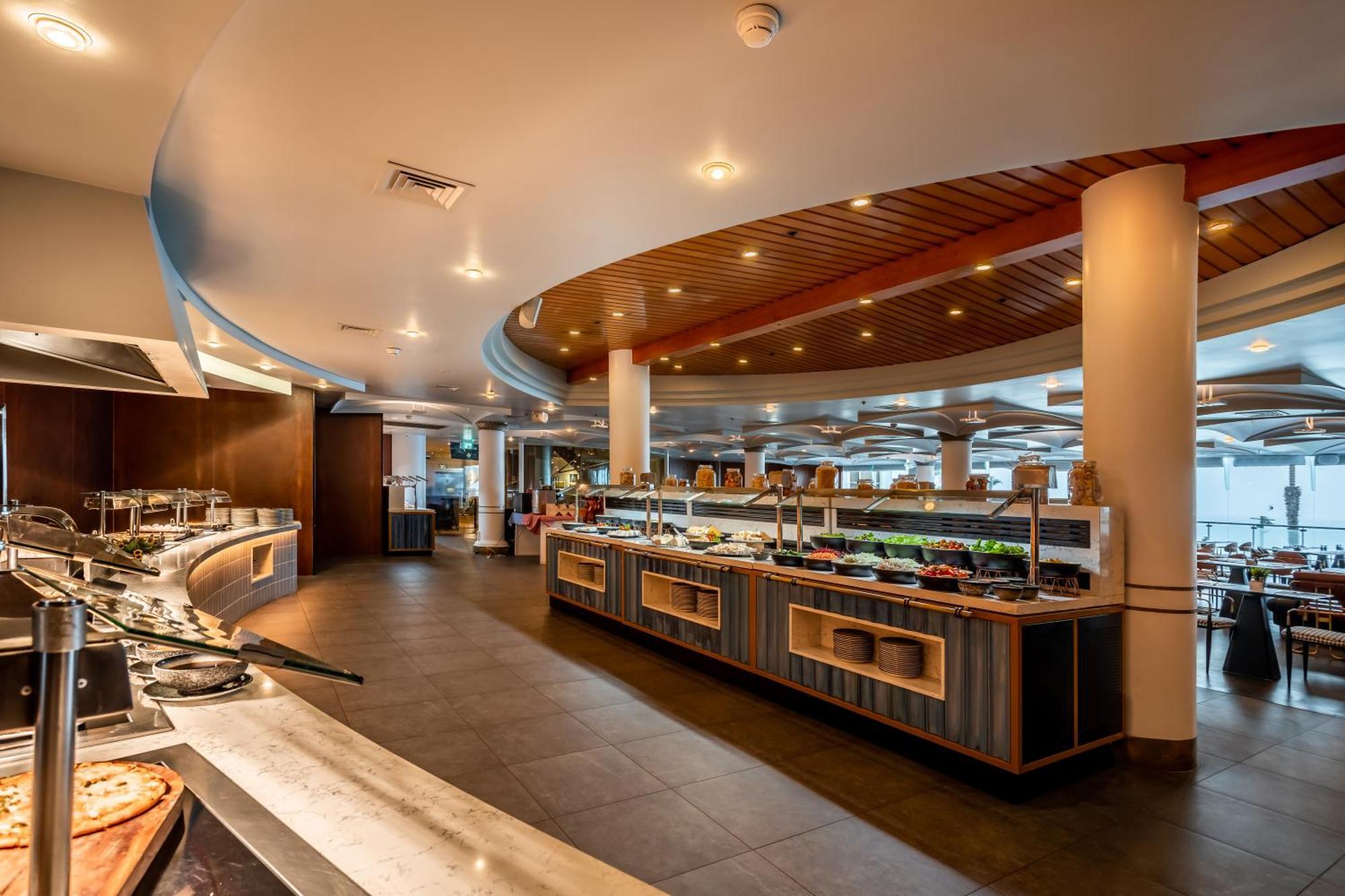 Daniel Herzliya Hotel Екстер'єр фото The buffet at the restaurant